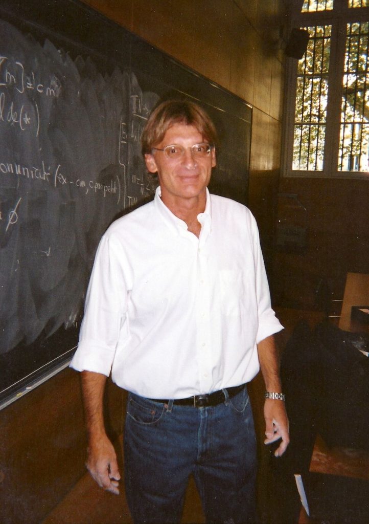 Pierre-Louis Lions teaching in front of a blackboard.© Wikipedia
